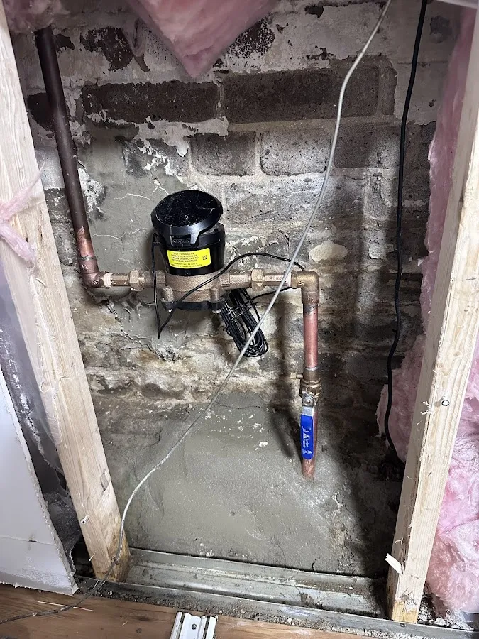 Flooded basement with professional water extraction equipment deployed during restoration
